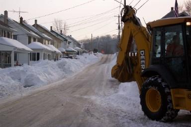 Rexmont - with backhoe to remove snow
